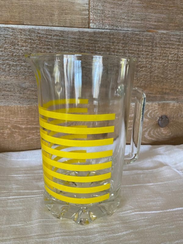 Italian glass pitcher clear glass yellow stripes close