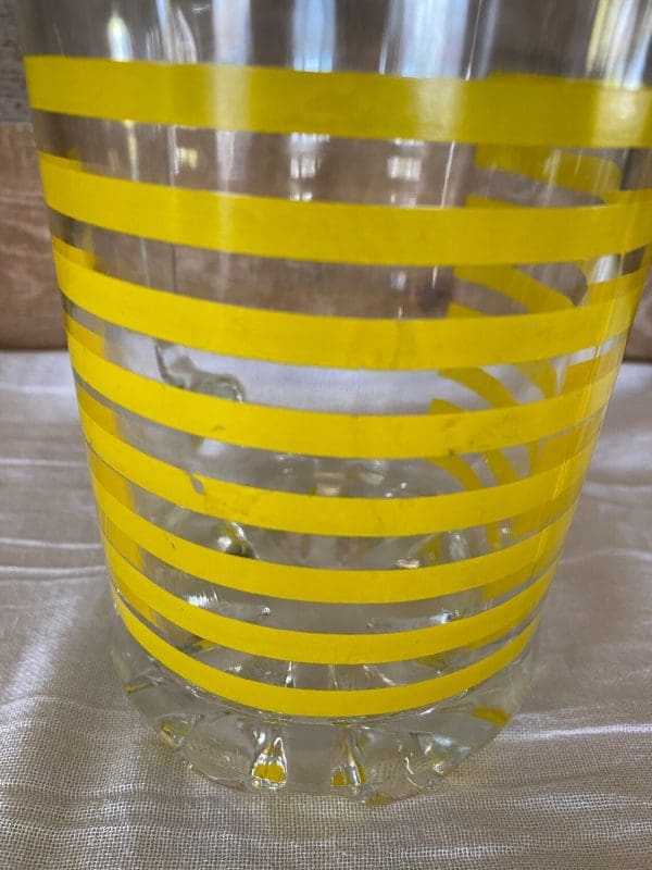 Italian glass pitcher close of paint wear