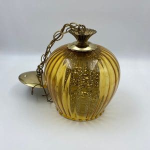 vintage amber glass swag lamp on table