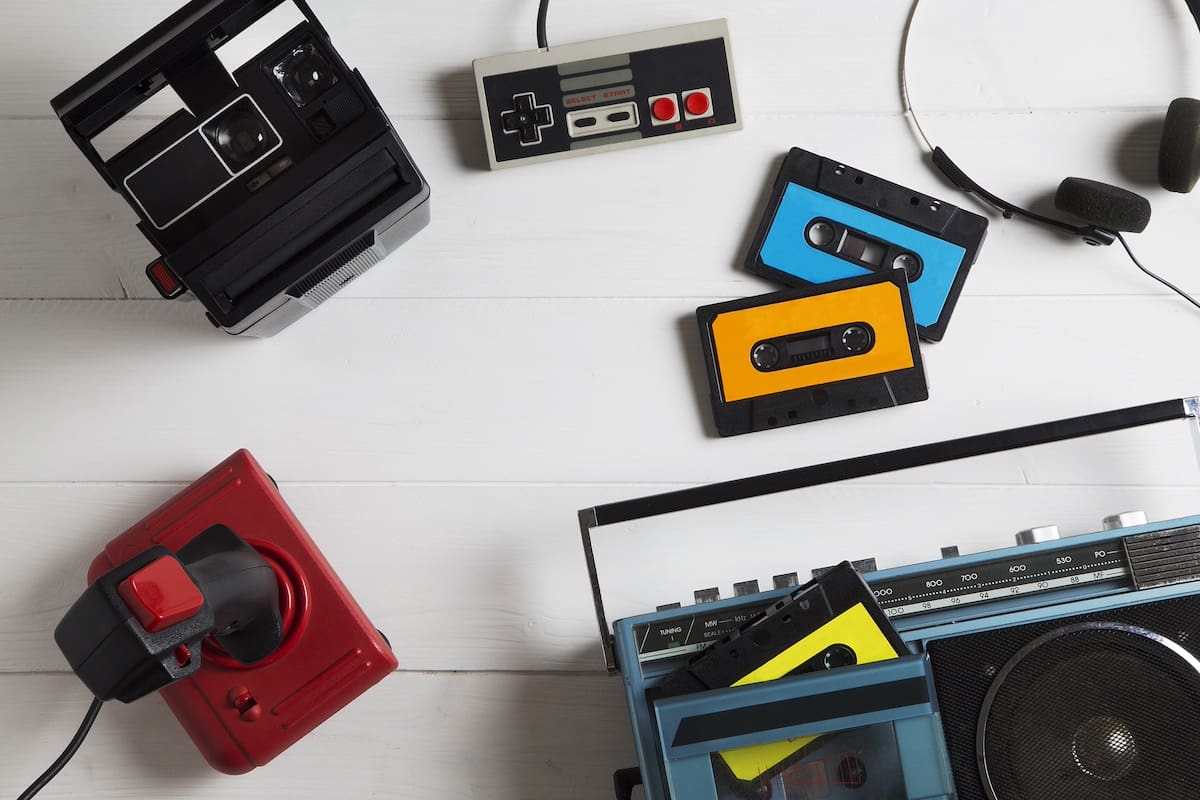 80s retro tech as home decor elements cassettes, Polaroide camera, game controlers