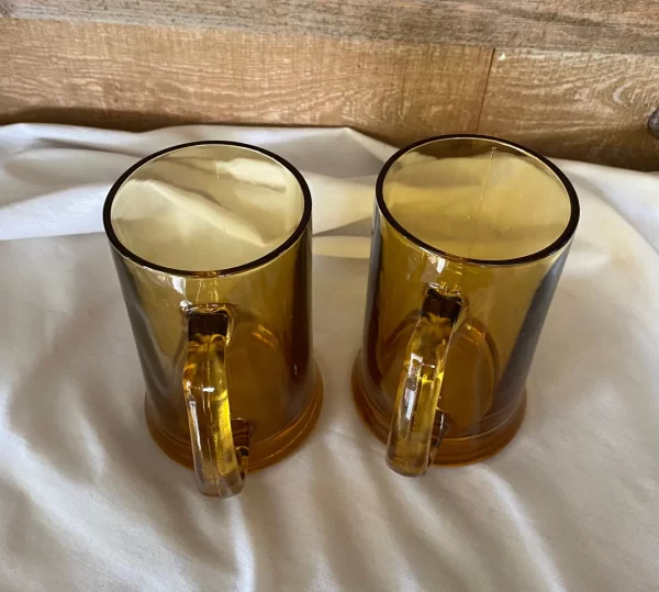 glass beer mugs top view pair