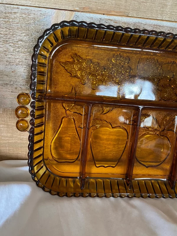 amber glass tray close to left handle