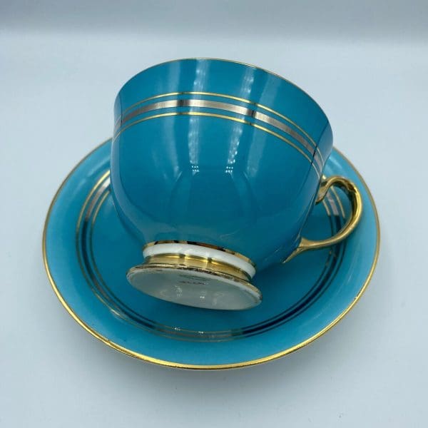 Aynsley England bone china Turquoise Blue Tea Cup and Saucer Set with gold and silver bands