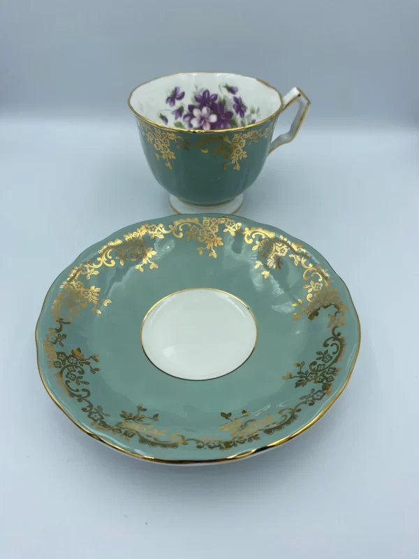 Aynsley Teacup and Saucer Bone China Turquoise Teal Blue with Gold and Purple Violets white inner ring on saucer