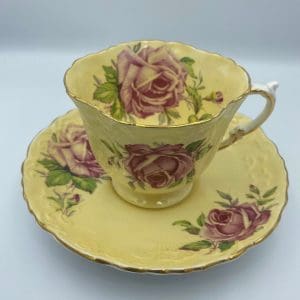 Aynsley cabbage rose on yellow front