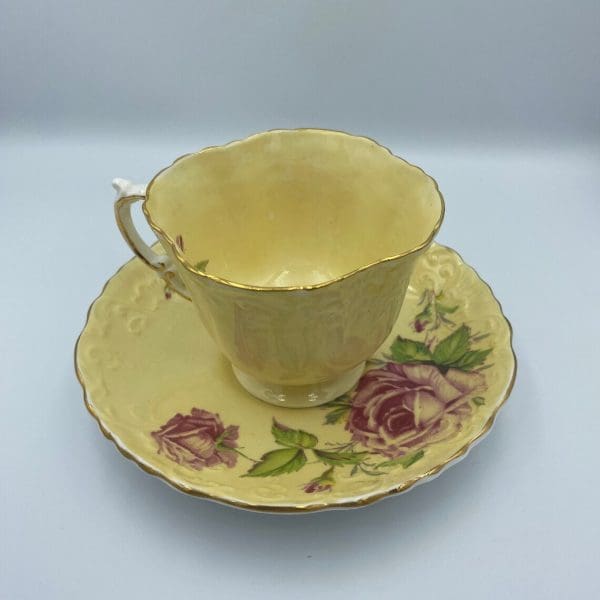 Aynsley cabbage rose tea cup and saucer set yellow ground back of teacup