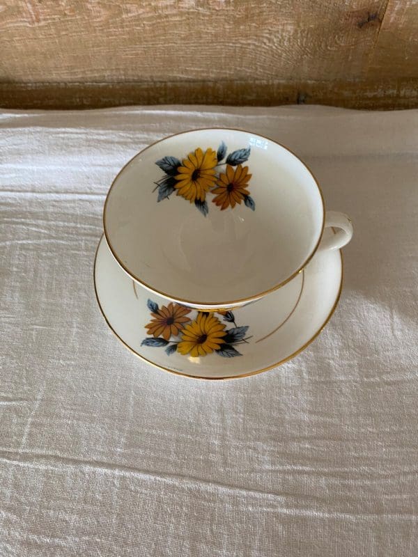 flowered tea cups Black Eye Susan top