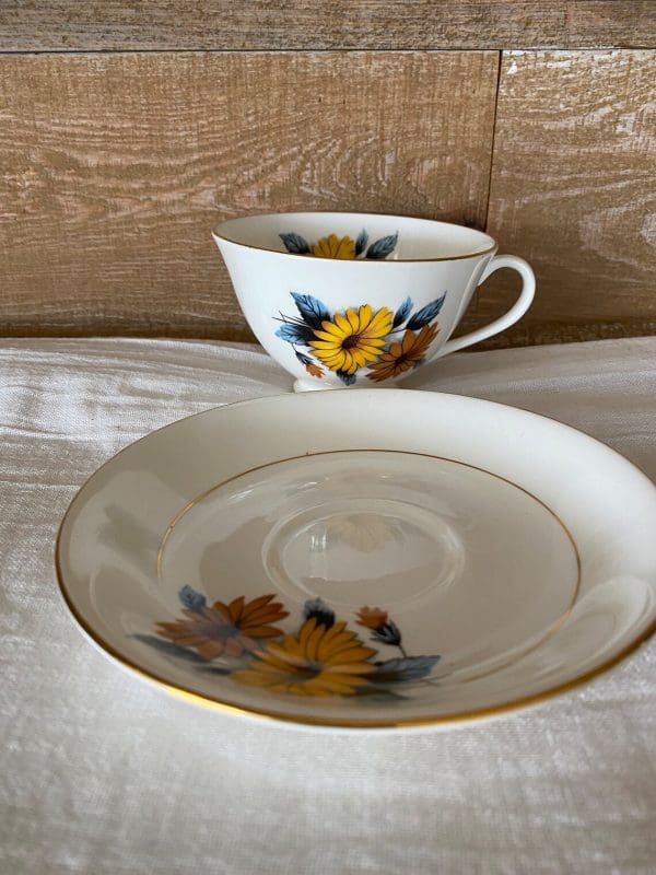 flowered tea cups Black Eye Susan edge of saucer