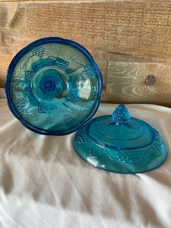 vintage blue glass candy dish with lid on side