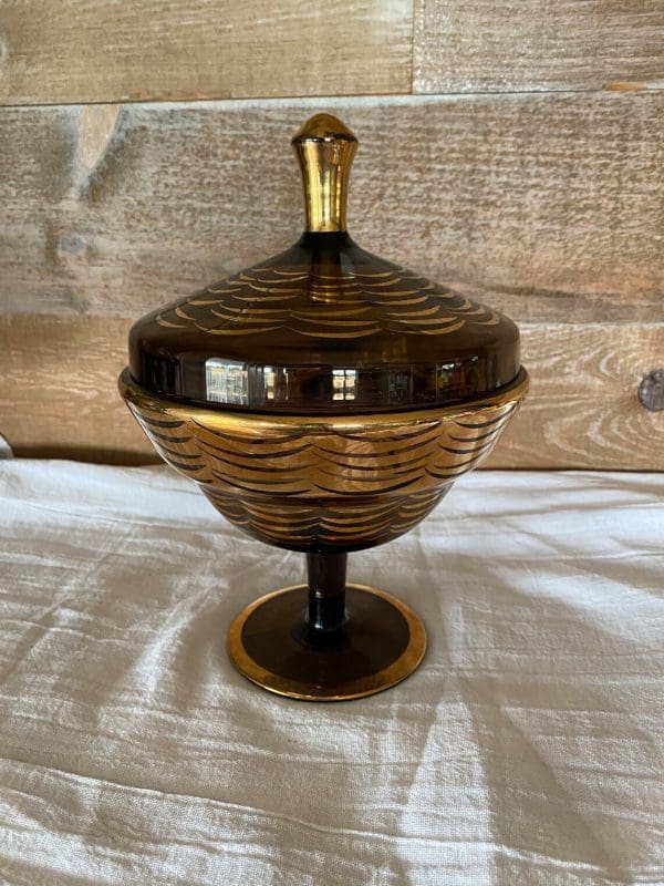 amber candy dish with lid front view showing gold on amber glass