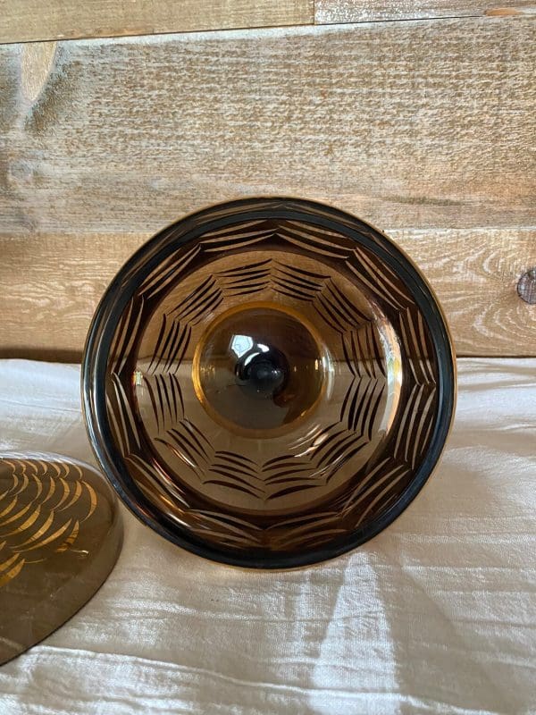 amber candy dish with lid inside of dish