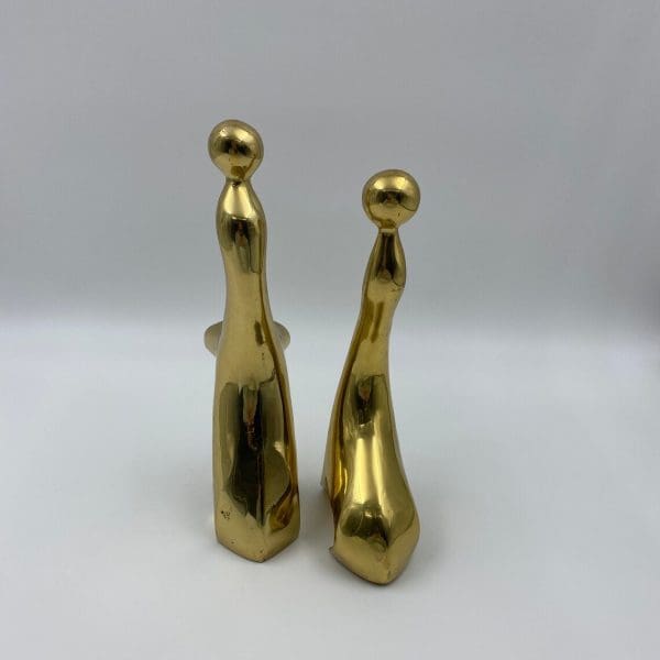 vintage brass figurines backs of sea lions