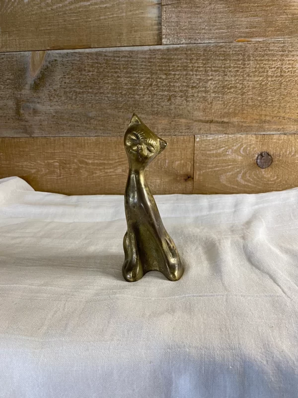 vintage brass cat front head tilted