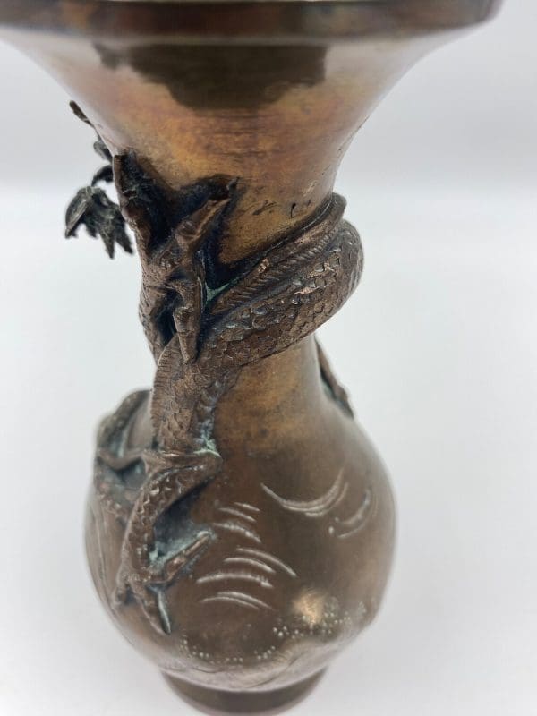 antique Japanese bronze vase close showing dragon scales