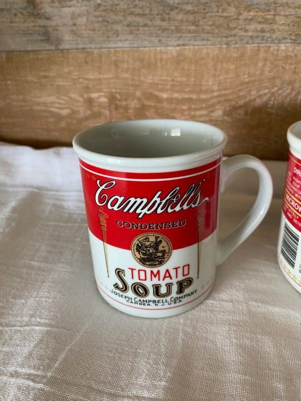 Campbell soup mugs pair front of one