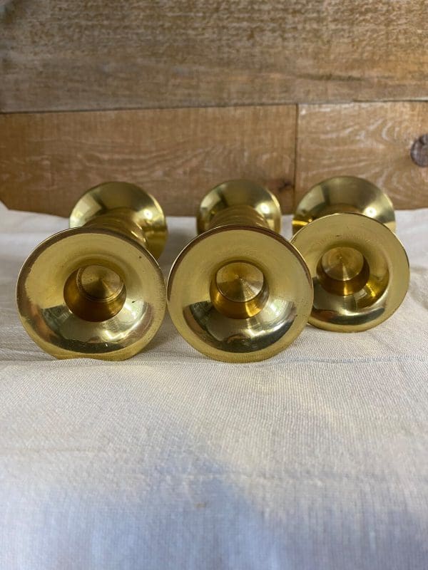 vintage brass candle holder set of three tops