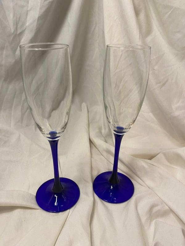 vintage champagne flutes with blue stems pair