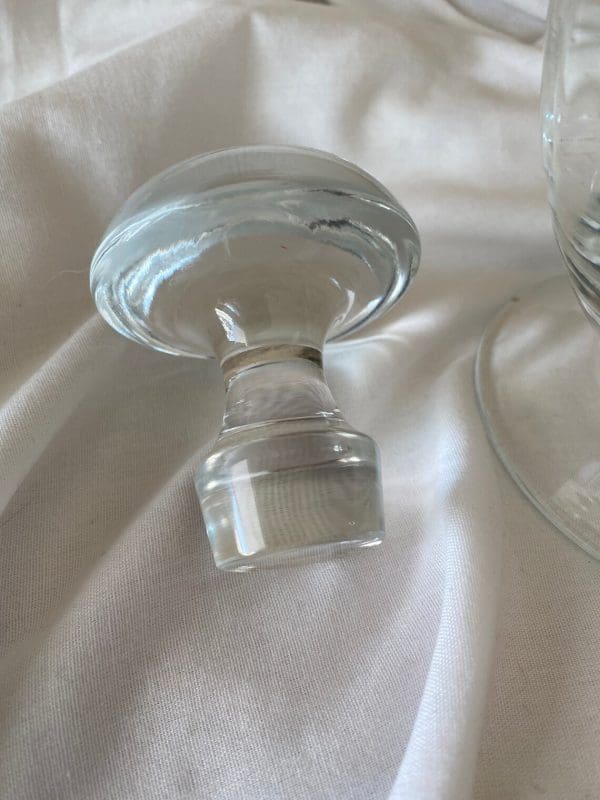 etched glass decanter with stopper close of mushroom shape stopper