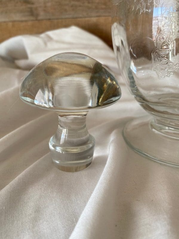 etched glass decanter with stopper close of stopper