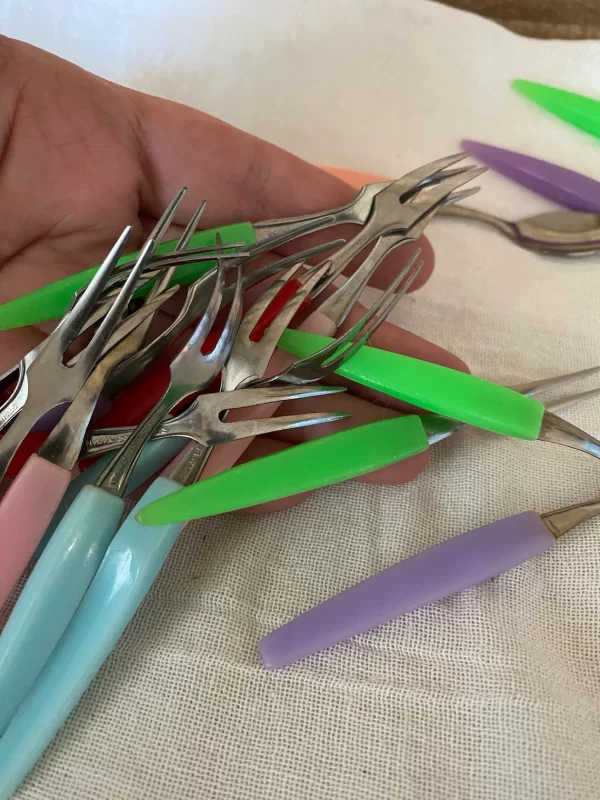 Hors d oeuvre forks Multicolor Plastic Handles Stainless Fork Vintage Set of Fifteen Little Forks in hand to show size