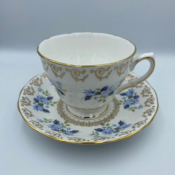 vintage Cloclough bone China blue flower gold trim