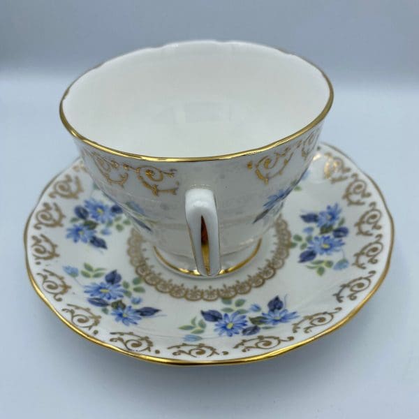 vintage Cloclough bone china tea cup and saucer handle facing