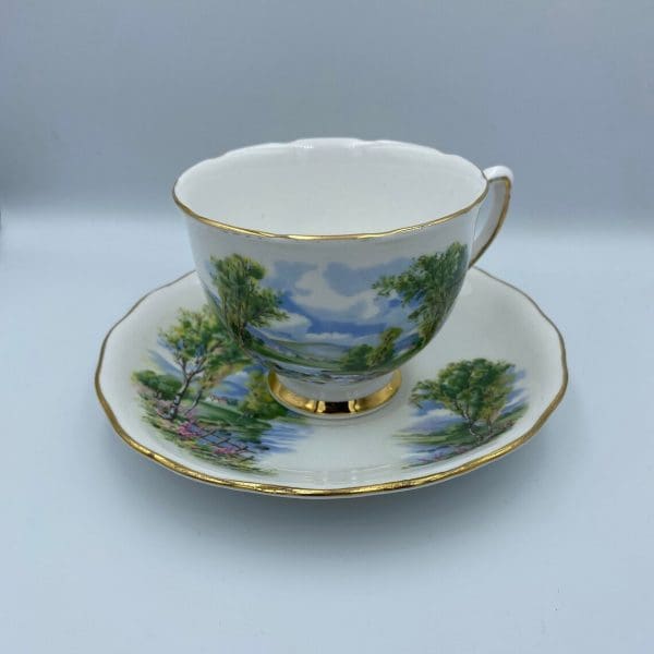 Colclough china tea cup and saucer stream scene