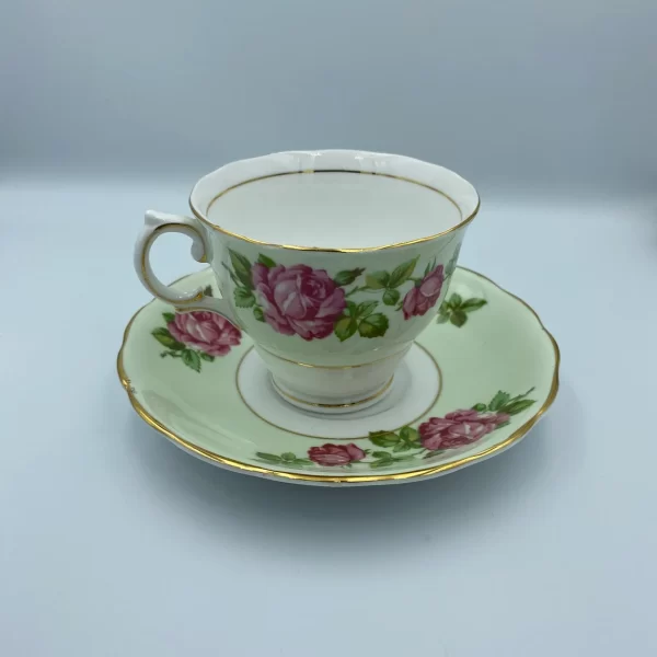 mint green tea cups Colclough Green Tea Cup and Saucer with Pink Roses side handle on left