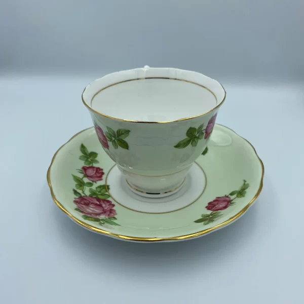 mint green tea cups Colclough Green Tea Cup and Saucer with Pink Roses back of tea cup handle on opposite side