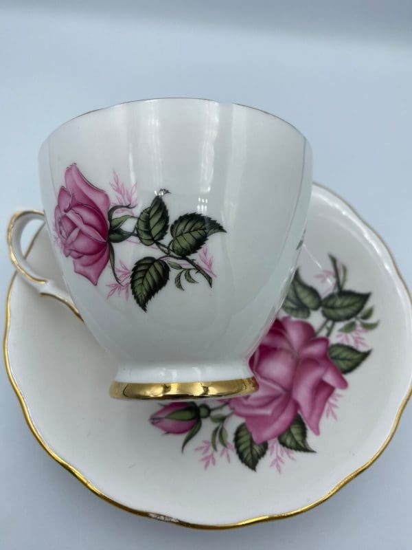 vintage rose tea cups Colclough Long Stem Pink Rose Teacup and Saucer Set back on top of saucer