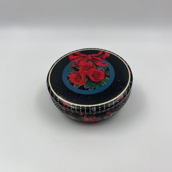 vintage cookie tins red blue white on black ground