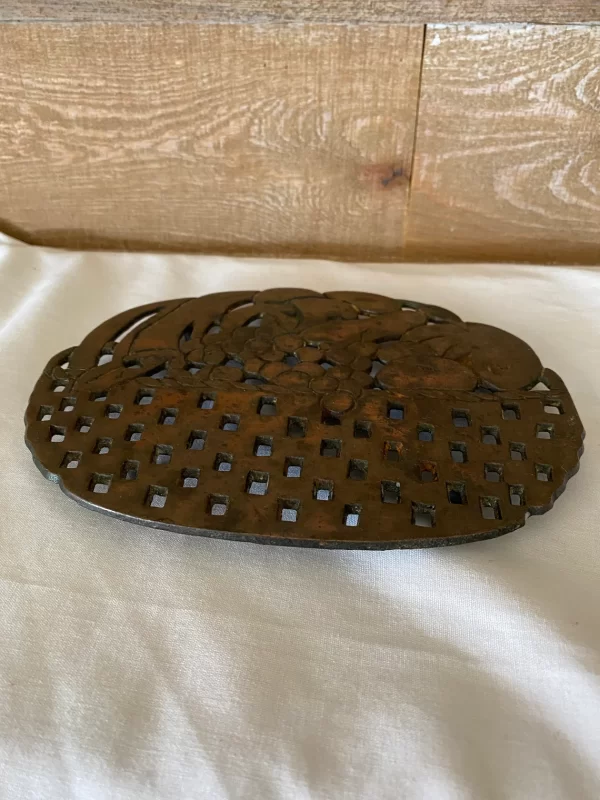 vintage trivets laying flat