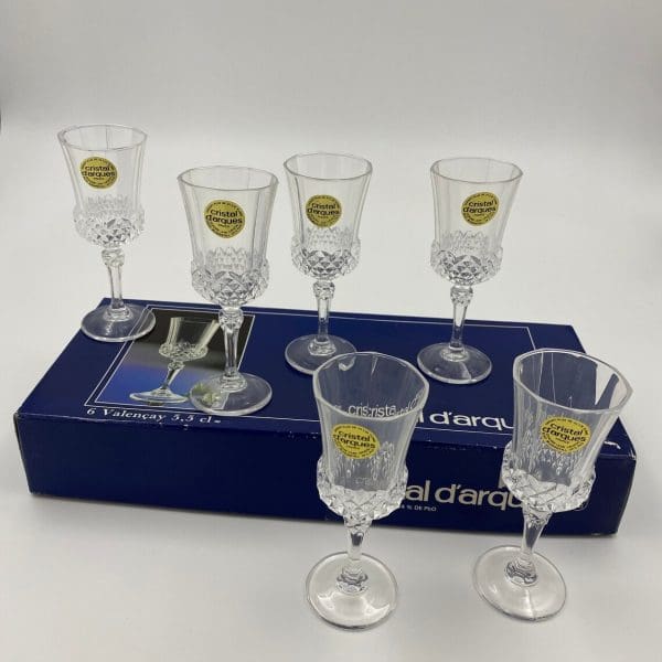 crystal dessert wine glasses sitting on original box