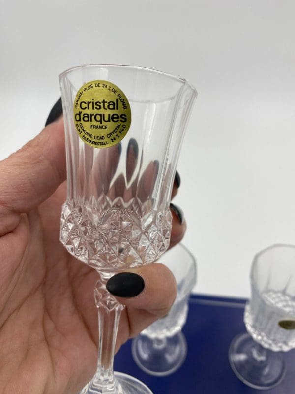 crystal dessert wine glasses in hand to show size