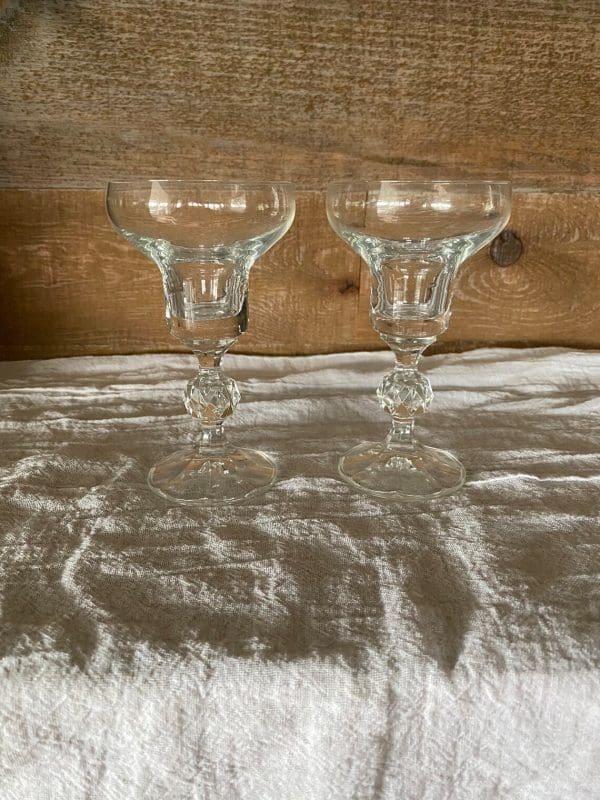 vintage crystal champagne coupes with crystal ball stem together pair