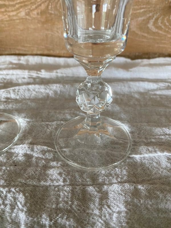 vintage crystal champagne coupes with crystal ball stem showing the crystal ball close