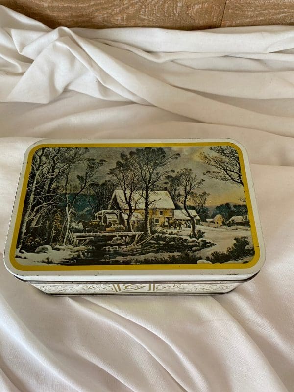 Currier and Ives tins top winter scene