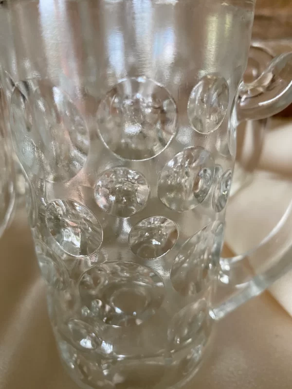 vintage glass beer mugs close showing dots design