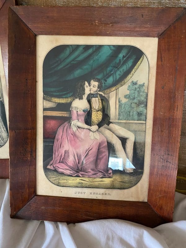 Kellogg lithographs front of Just Engaged wooden framed