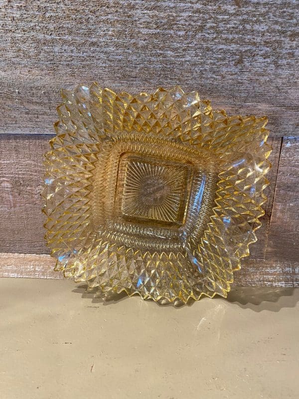 amber hobnail glass on side