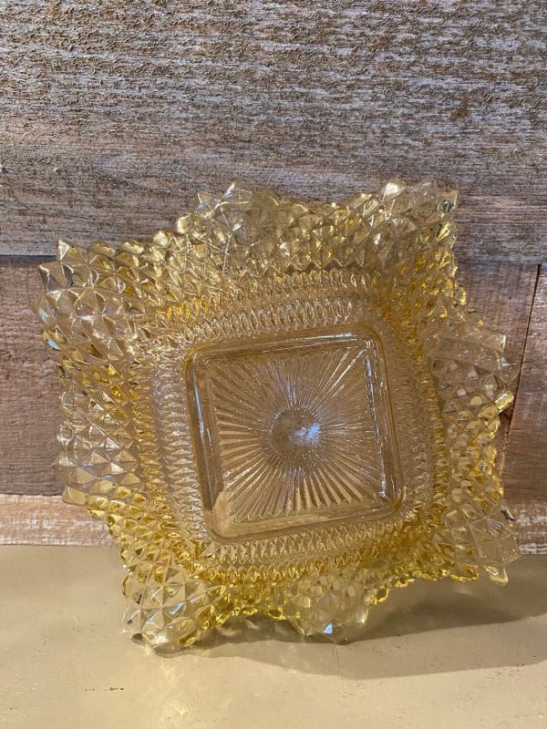 amber hobnail glass on side showing inside beautiful light amber