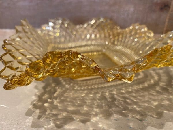 amber hobnail glass edge of candy dish