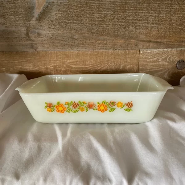 Fire king loaf pan Gingham Flowers Plaid orange yellow red green on milk glass left side