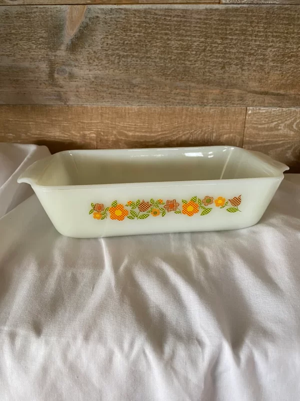 Fire king loaf pan Gingham Flowers Plaid orange yellow red green on milk glass left side