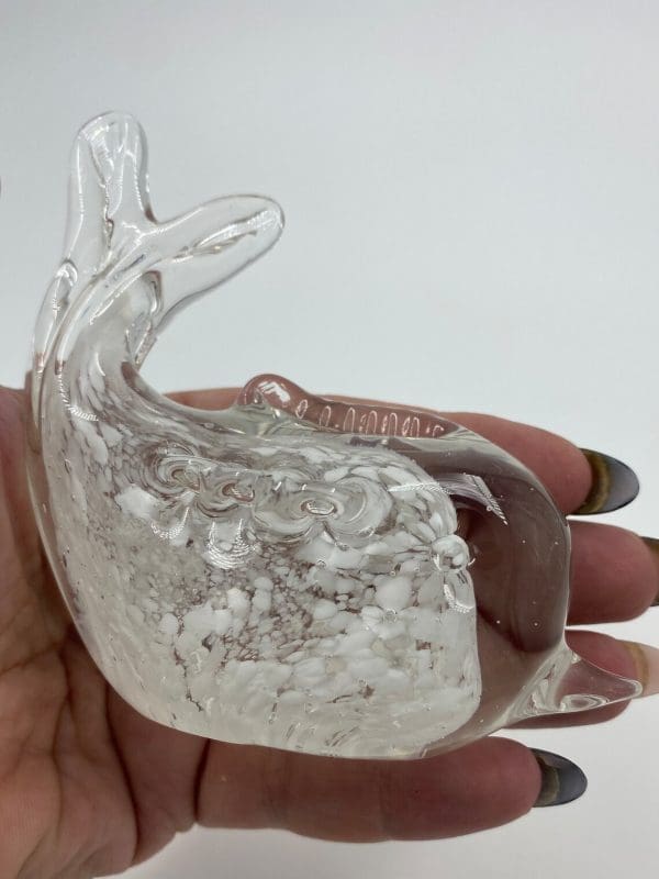 vintage glass fish in hand to show size