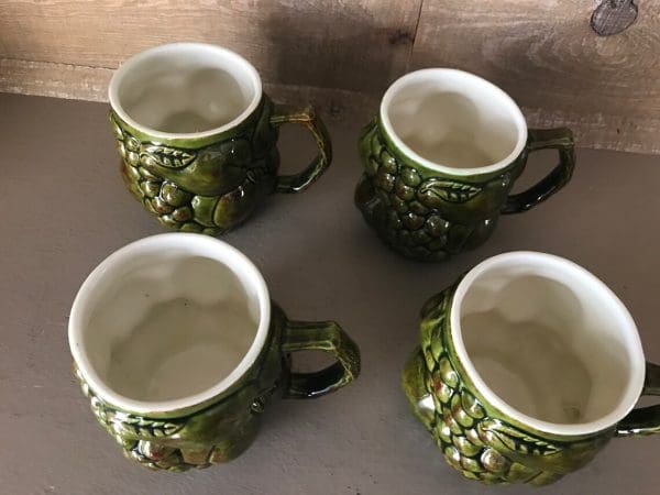 green coffee mugs tops showing inside