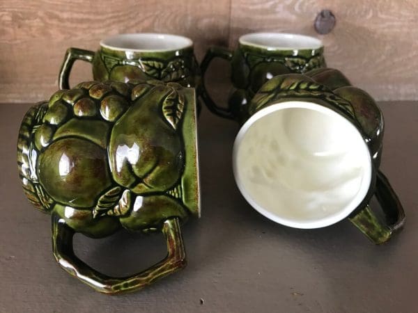 green coffee mugs inside