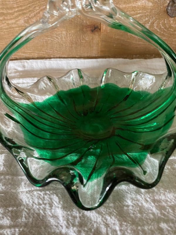 green glass basket hand blown close back