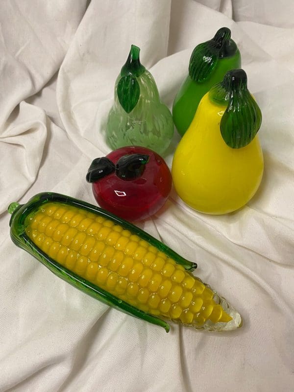 glass fruit corn pears and tomato tops