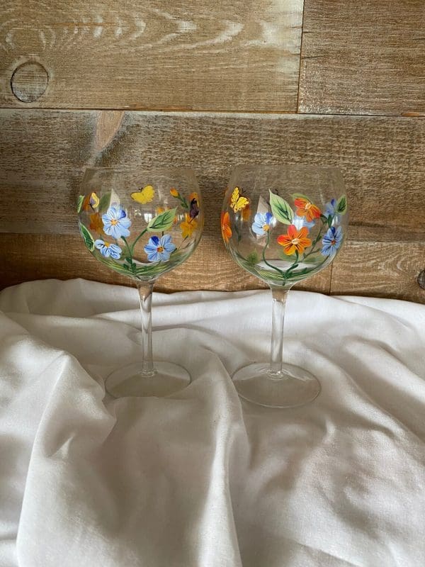 hand painted goblets blue and orange flowers and butterfly design